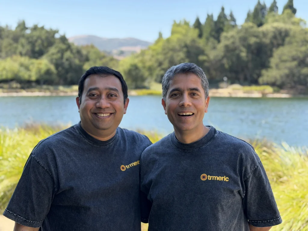 Trmeric co-founders Debottam Datta and Sidharth Bohra by lake